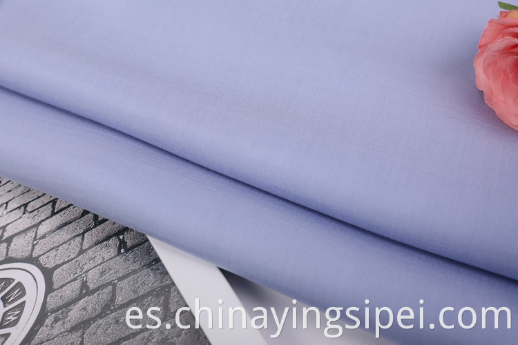 Rollos de tela de material de nylon teñido tejido tejido de buena calidad para camisa para camisa